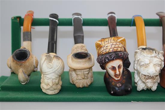 A collection of Meerschaum pipes and cheroot holders,